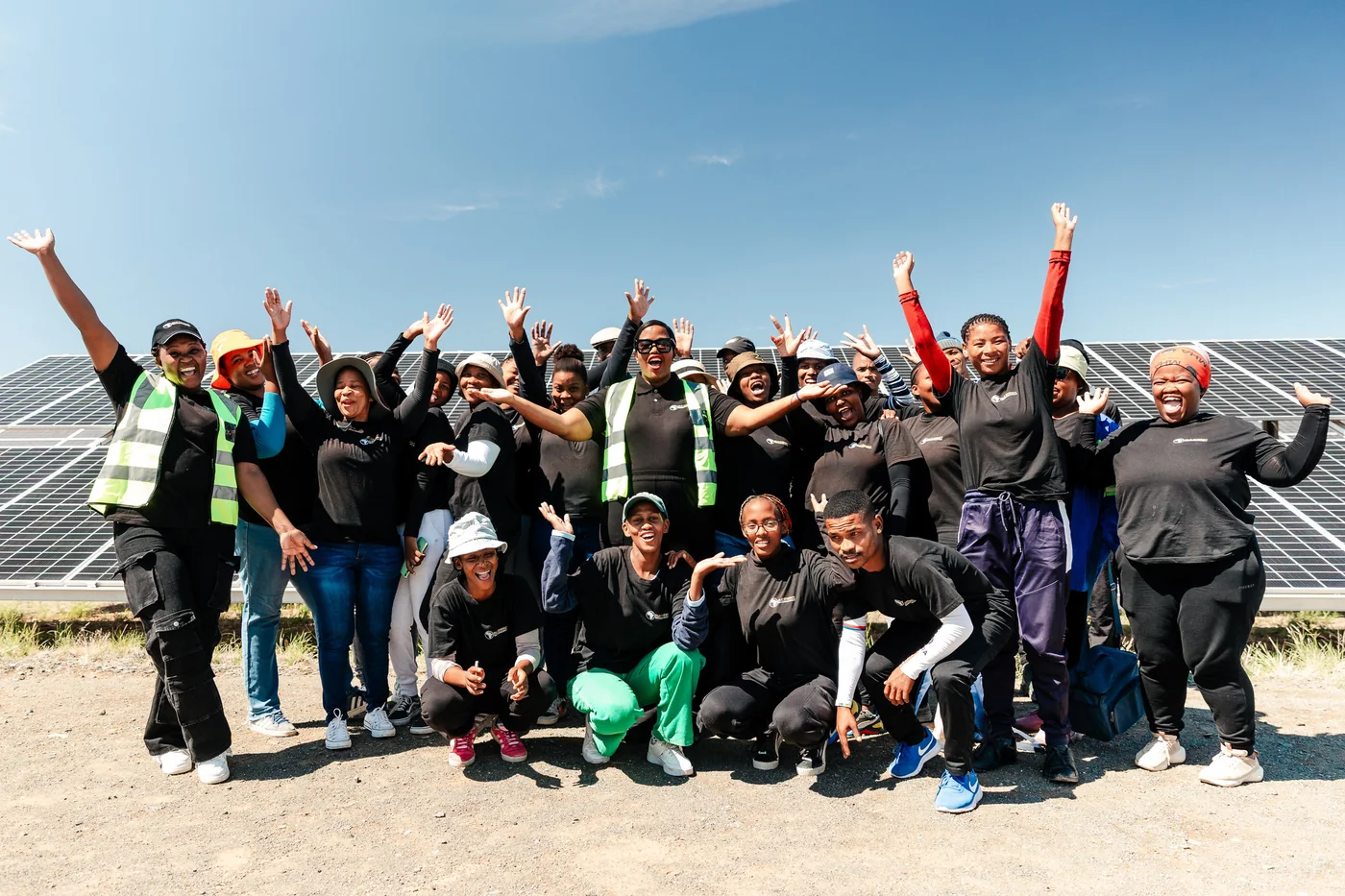 Group of solar training learners at a photovoltaic installation